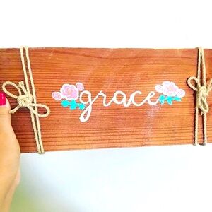 Wooden hand painted wall decor sign that says Grace